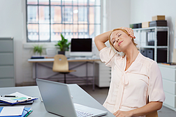 Tired young businesswoman taking a break