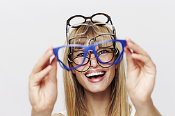 Fun young student in glasses